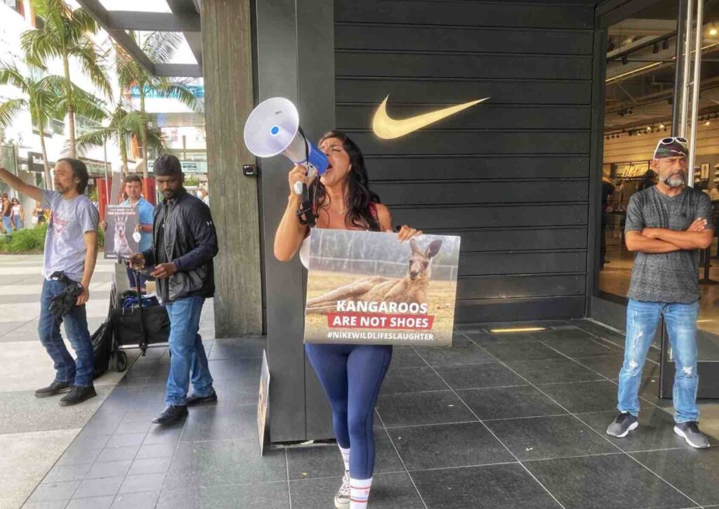 Photo of animal rights activist in Los Angeles protesting Nike's use of kangaroo skin